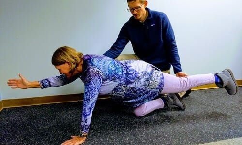 Chiropractor Wheaton performing rehabilitation