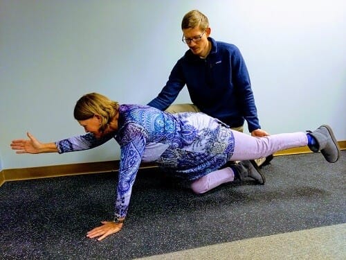 Chiropractor Wheaton performing rehabilitation